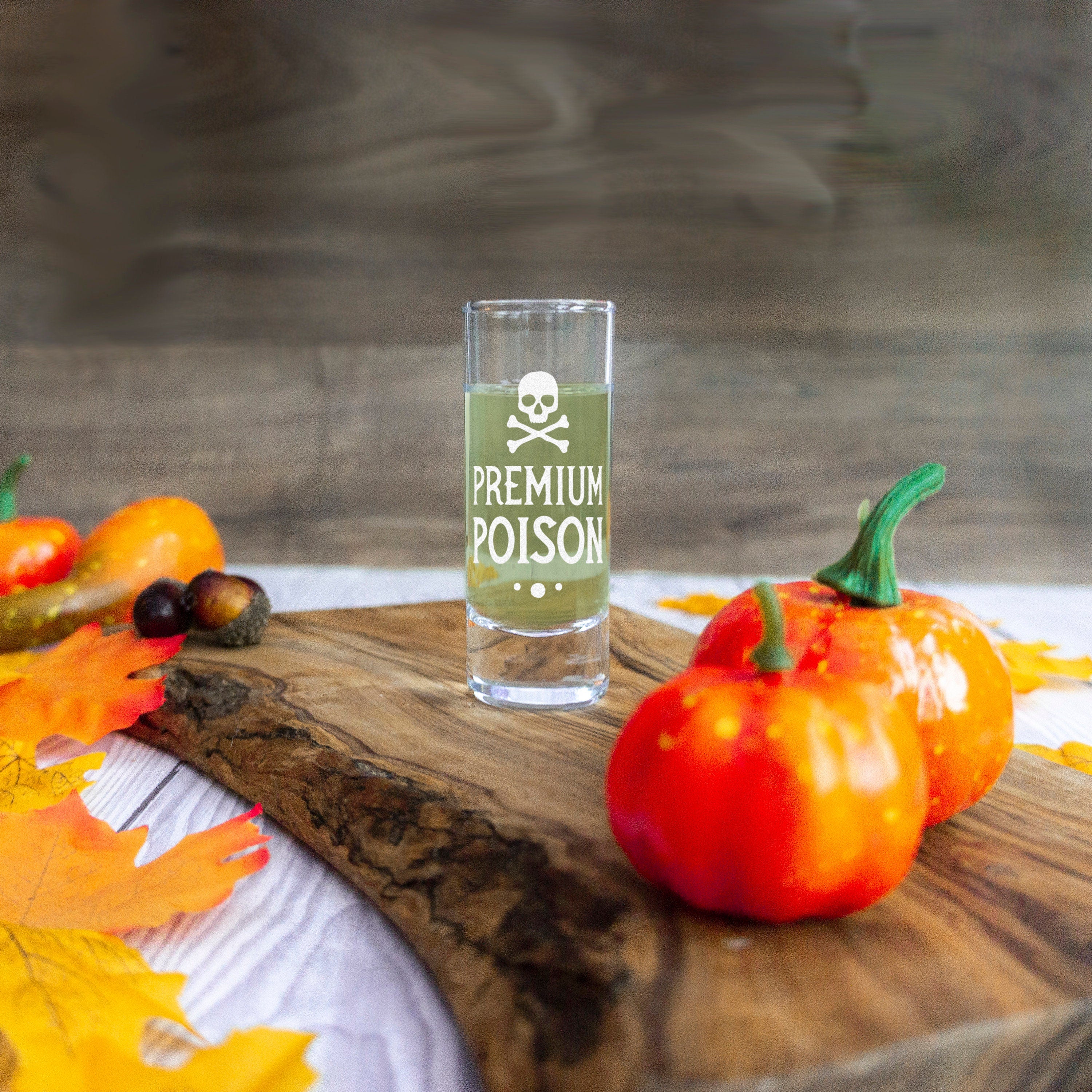 Personalised poison shot glass design for a halloween party home decor. Drinks glass engraved with spooky design for halloween supplies