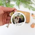 Round photo keyring with personalised caption. Christmas anniversary gift for boyfriend or girlfriend. Picture circle key fob gift for him