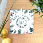 Baby's first Christmas card with tree ornament hanging decoration. Child's 1st xmas bauble with greetings card personalised with name