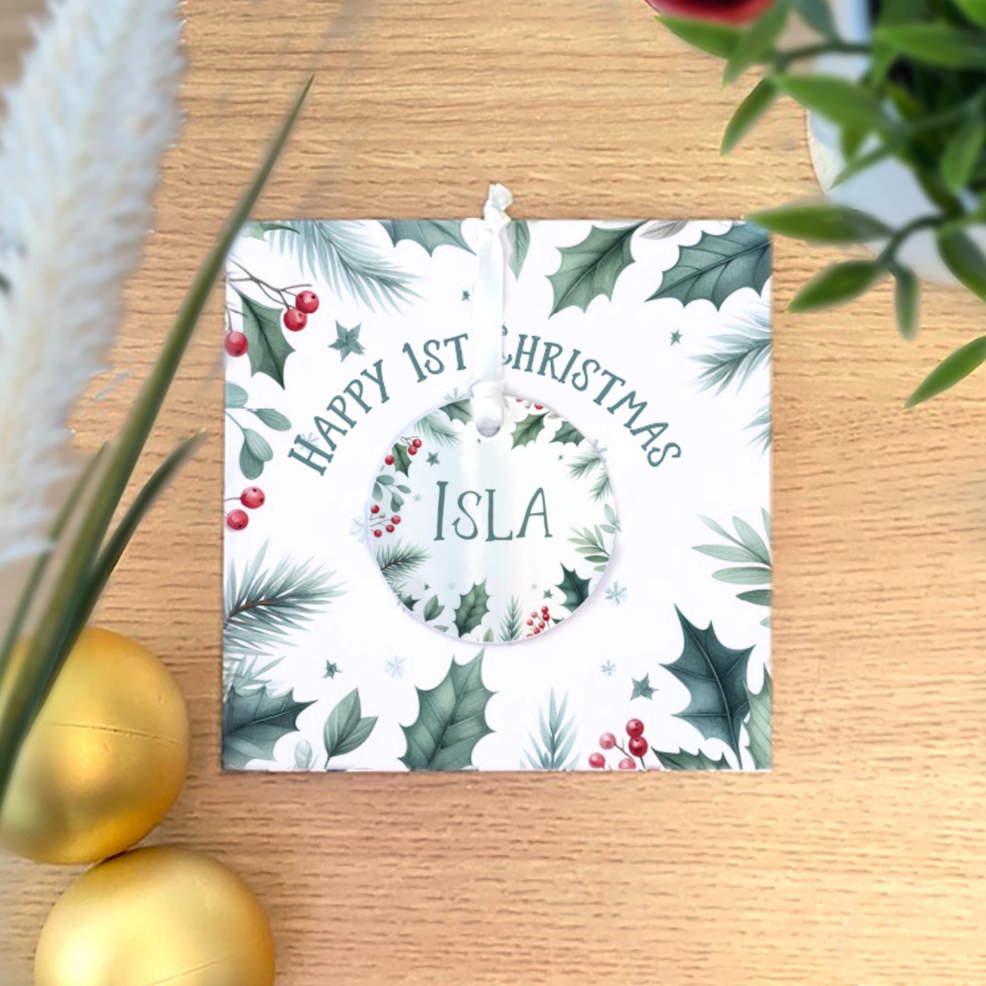 Baby's first Christmas card with tree ornament hanging decoration. Child's 1st xmas bauble with greetings card personalised with name