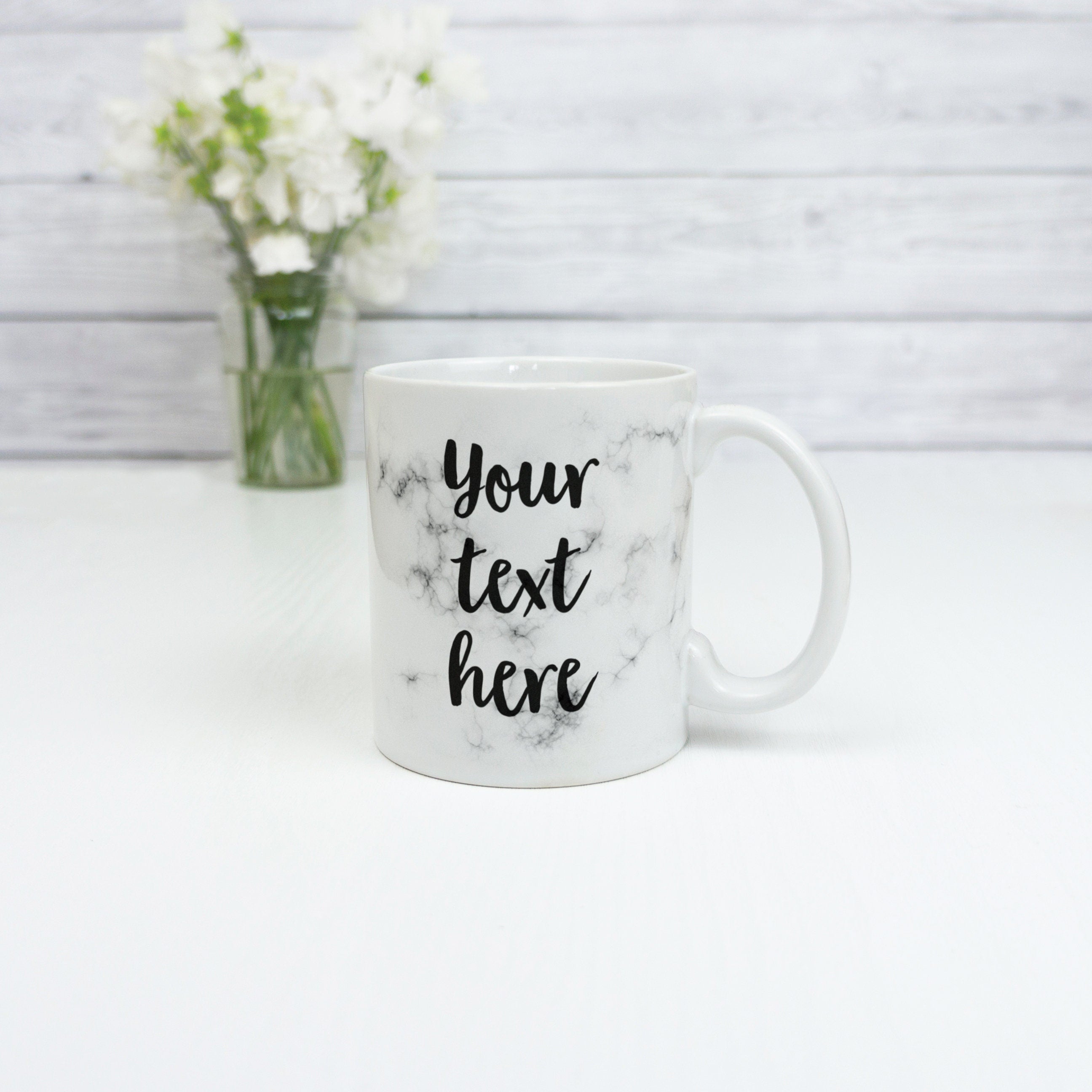 Custom text mug with any personalised words marble background. Ceramic mugs with your text here in script calligraphy font bold handwritten
