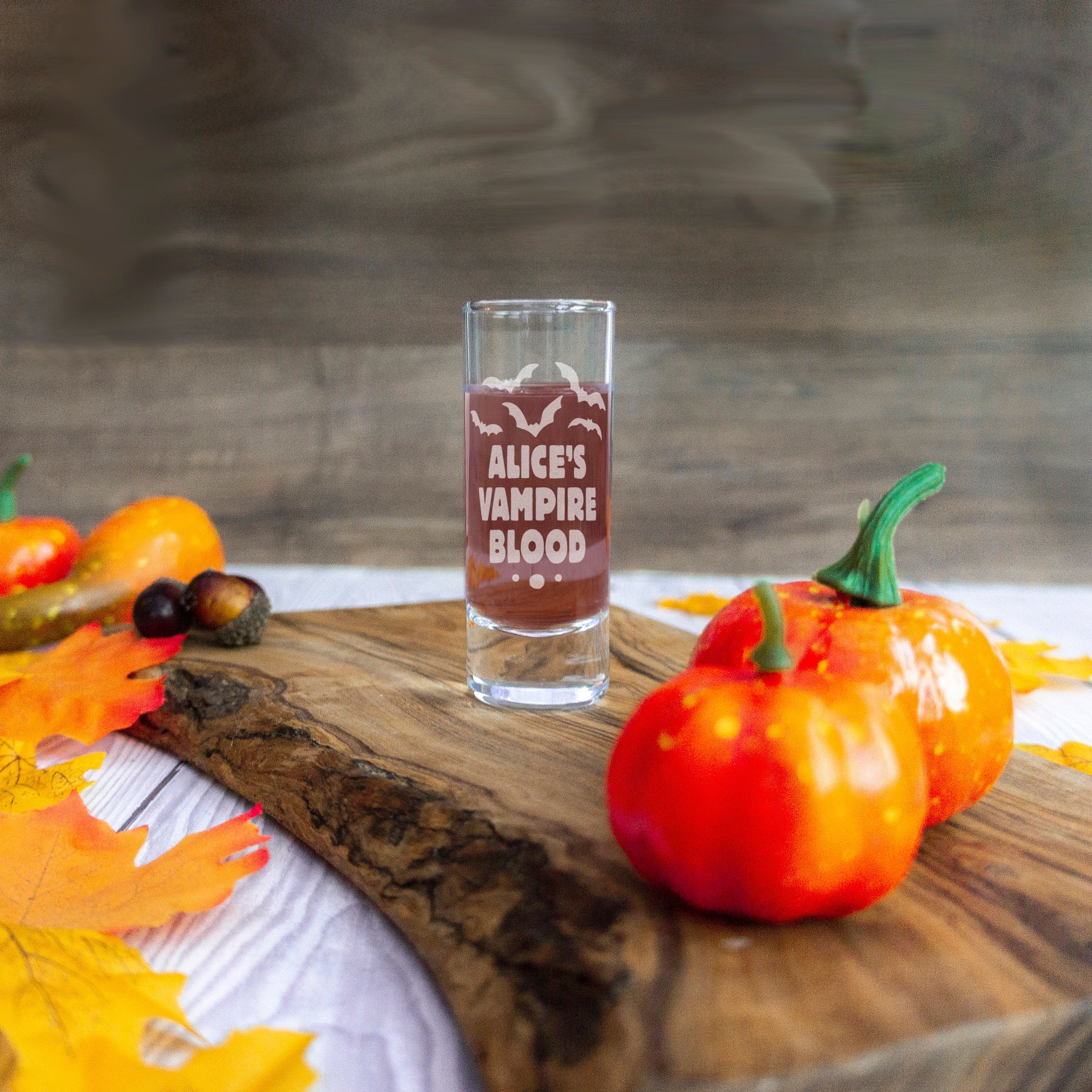 Personalised poison shot glass design for a halloween party home decor. Drinks glass engraved with spooky design for halloween supplies