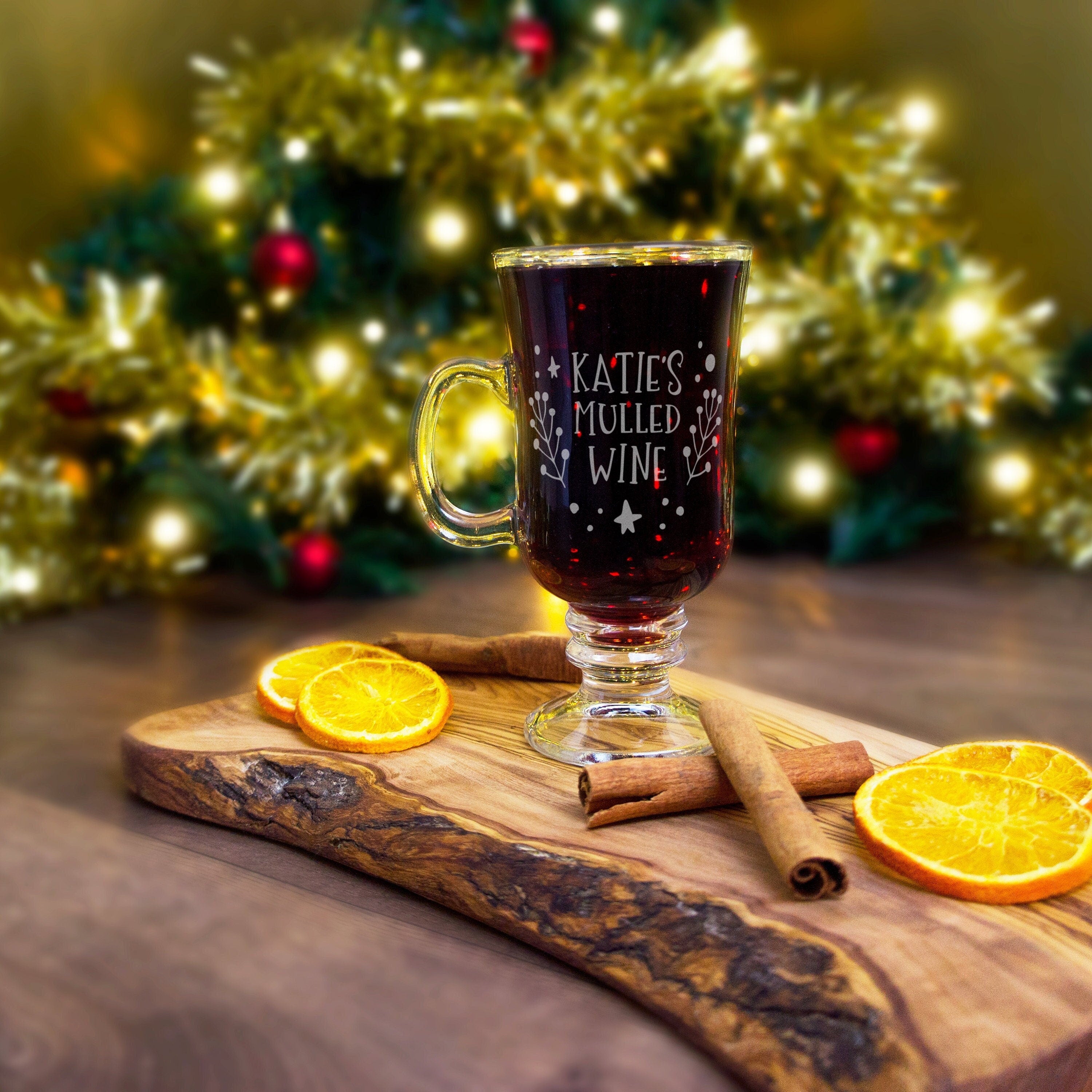 Personalised Christmas mulled wine glass with floral design