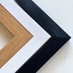 Framed photo print of new mother on cotton fabric.