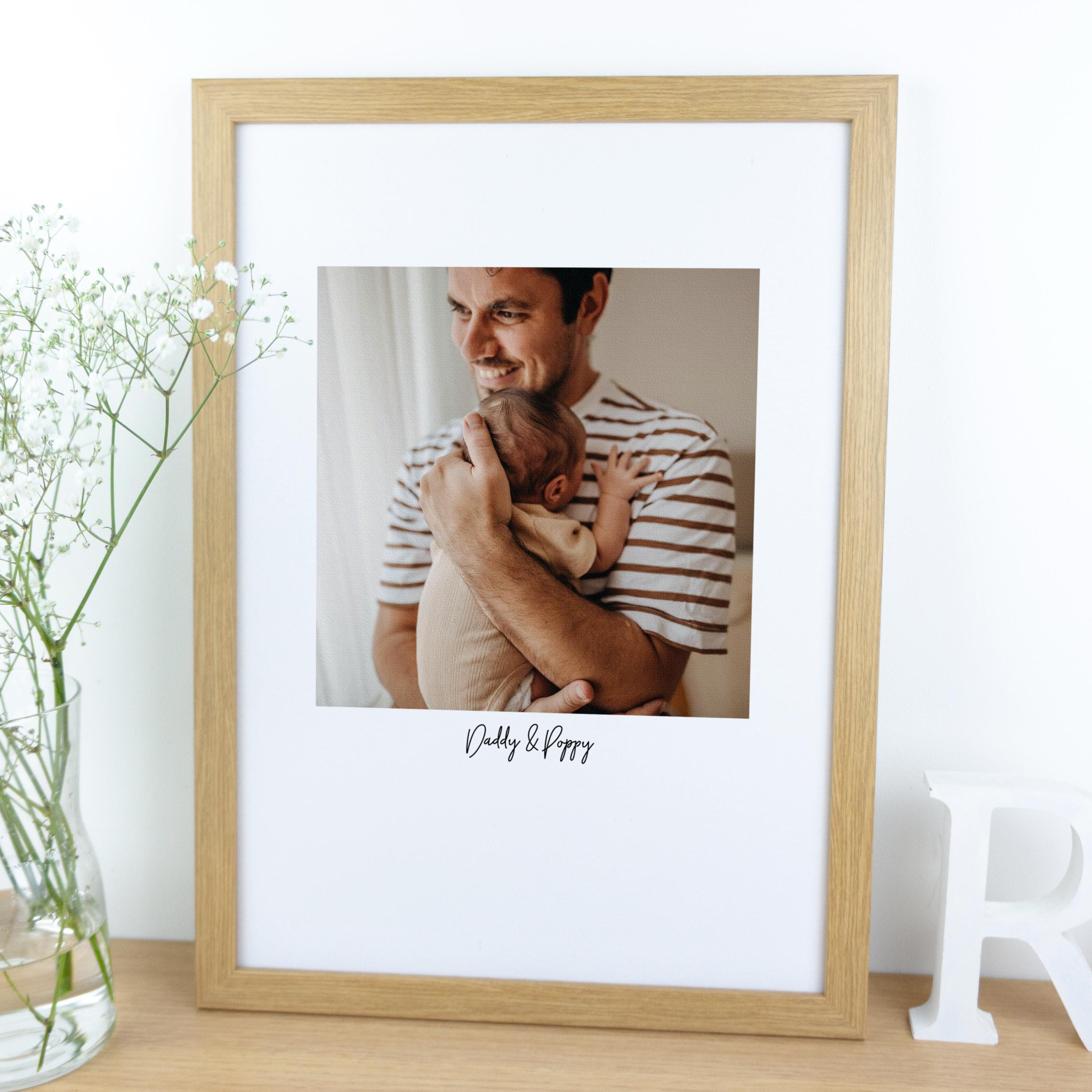 Framed cotton photo print of new dad printed on fabric.